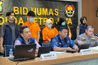 Wadirresiber Polda Metro Jaya, AKBP Fian Yunus (tengah). (Dok. Antara)